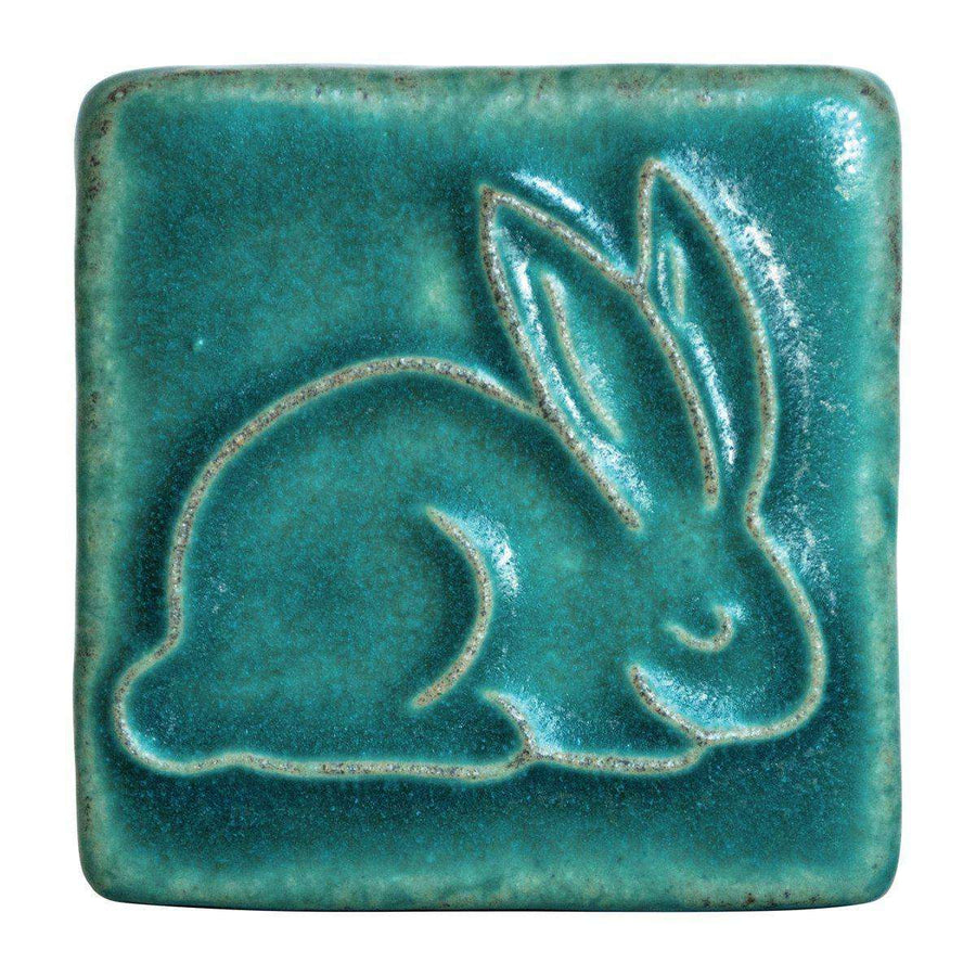 This ceramic Bunny Tile is featured in the matte turquoise Pewabic Blue glaze.