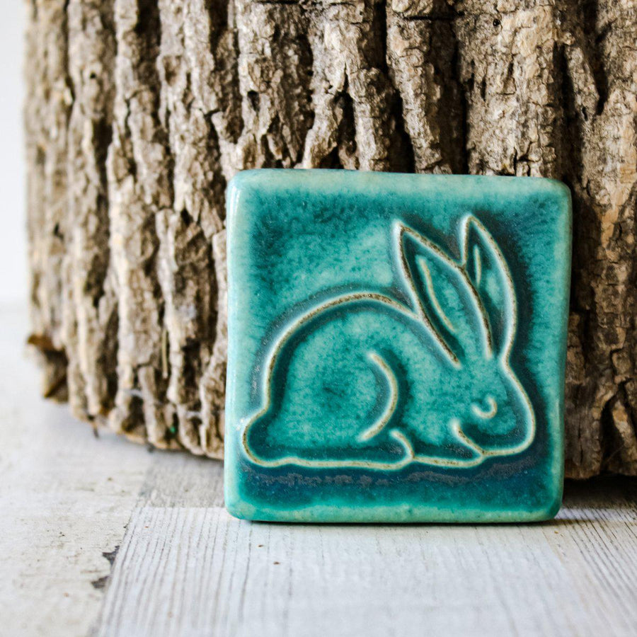 This ceramic Bunny Tile is featured in the matte turquoise Pewabic Blue glaze.