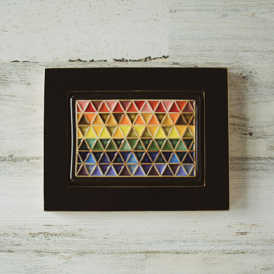 The Pride Tile can be hung either vertically or horizontally.