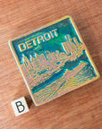 A Detroit tile with high contrast coloring sits next to the letter B to delineate which option is represented.