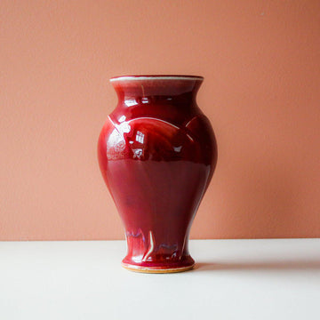 This vase features the the glossy, deep red Winterberry glaze.
