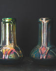 Two Celtic vases, one with a shiny Matte Green Iridescent finish and the other with more of the brushed, matte appearence.