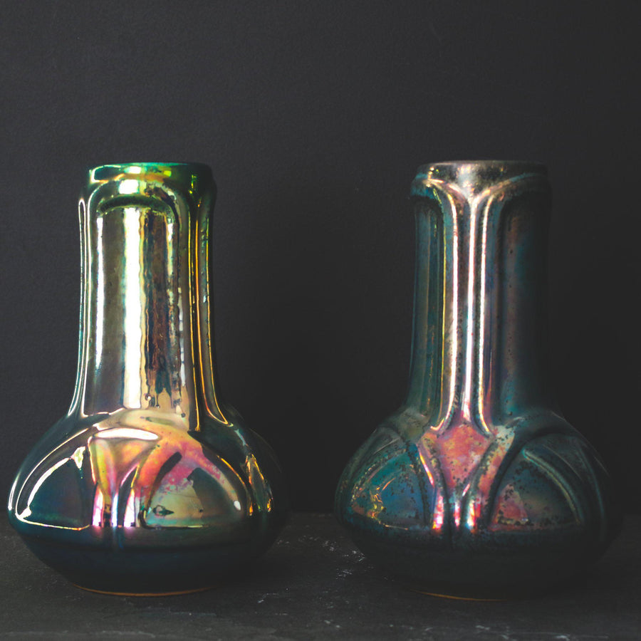 Two Celtic vases, one with a shiny Matte Green Iridescent finish and the other with more of the brushed, matte appearence.