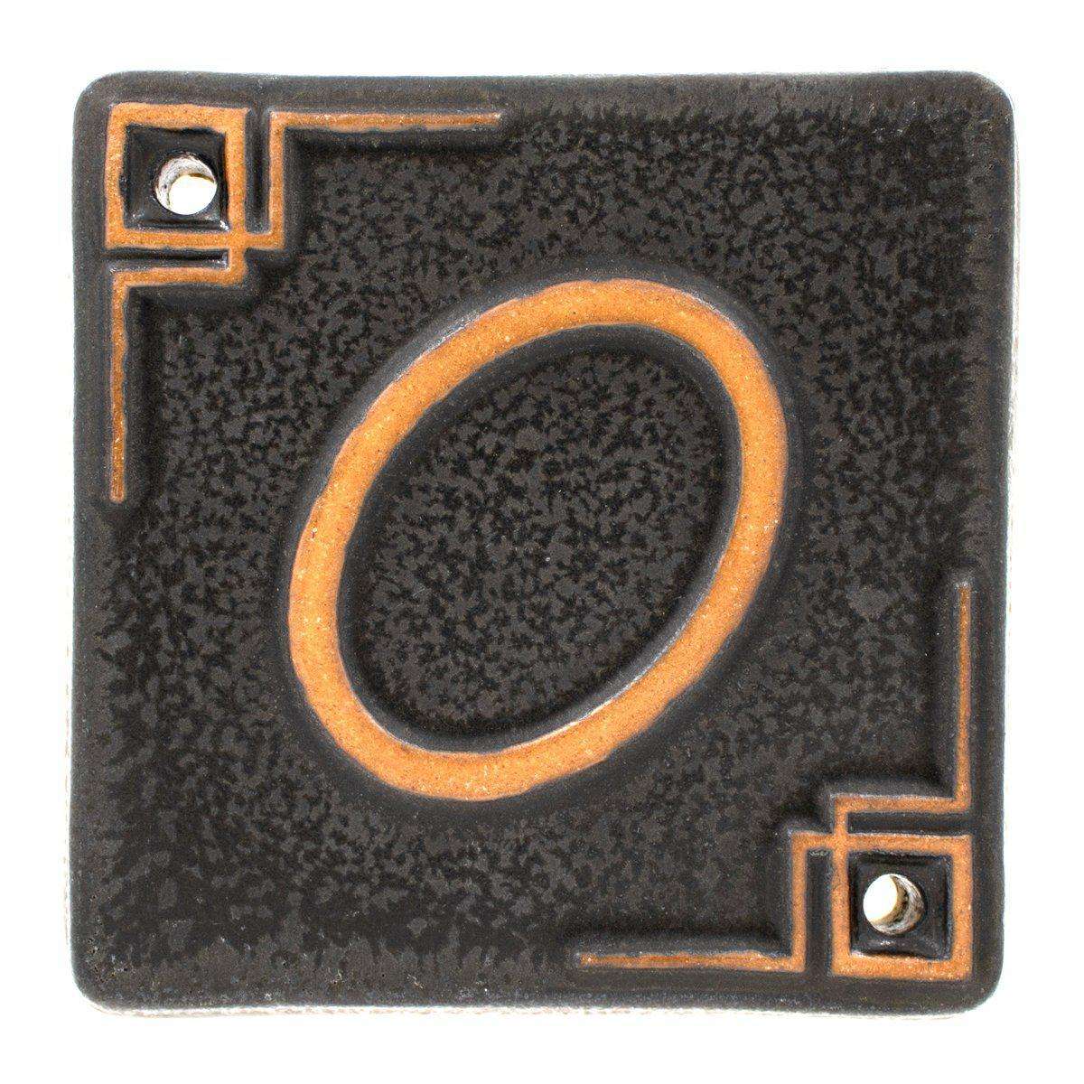 The Craftsman style ceramic 0 address number is in the matte dark gray Charcoal glaze option.