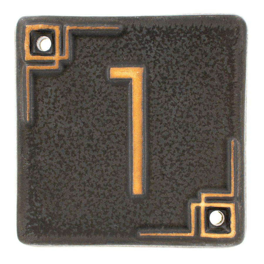 The Craftsman style ceramic 1 address number is in the matte dark gray Charcoal glaze option.