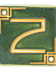 The Craftsman style ceramic 2 address number is in the matte green Leaf glaze option.
