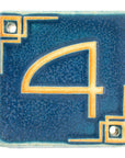 The Craftsman style ceramic 4 address number is in the matte blue Peacock glaze option.