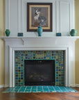 Blended blue and green fireplace and hearth. 