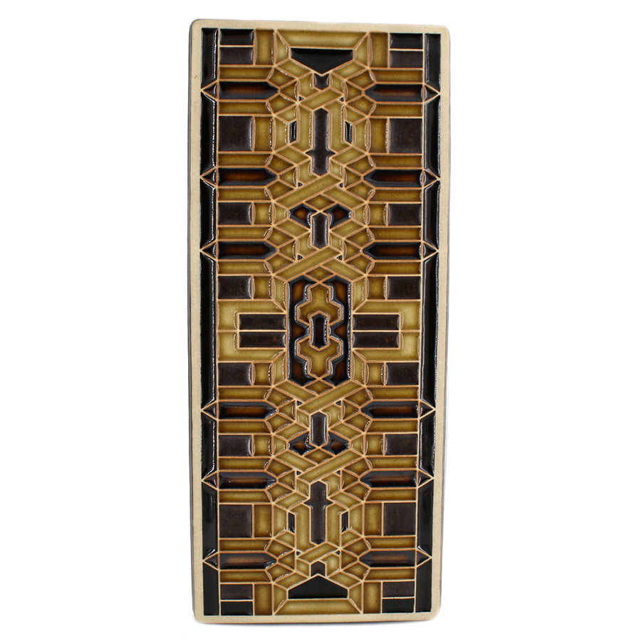 This Guardian Pattern Tile features glaze Style C which includes multiple shades of glossy honey and brown colors with black accents.