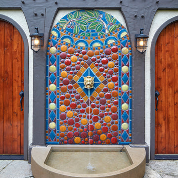 The intricate designed mosaic tile on this outdoor fountain mimics the circles and branches of the fountain at the Detroit Institute of Arts.