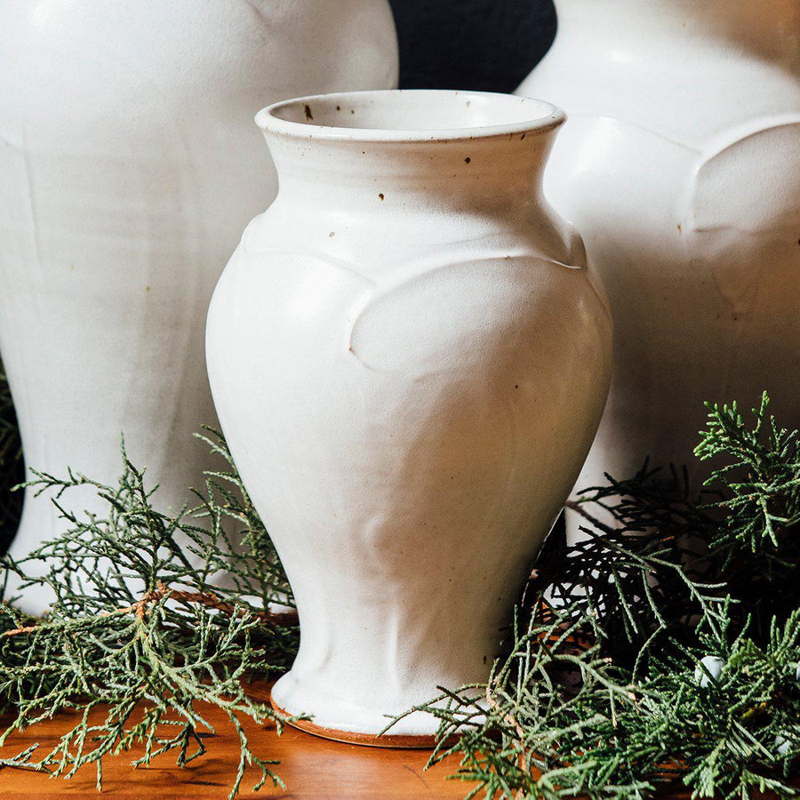 This vase features the creamy white Birch glaze that has some natural brown speckling.