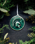 This ornament features the glossy deep green Kale glaze with a skinny white ribbon.