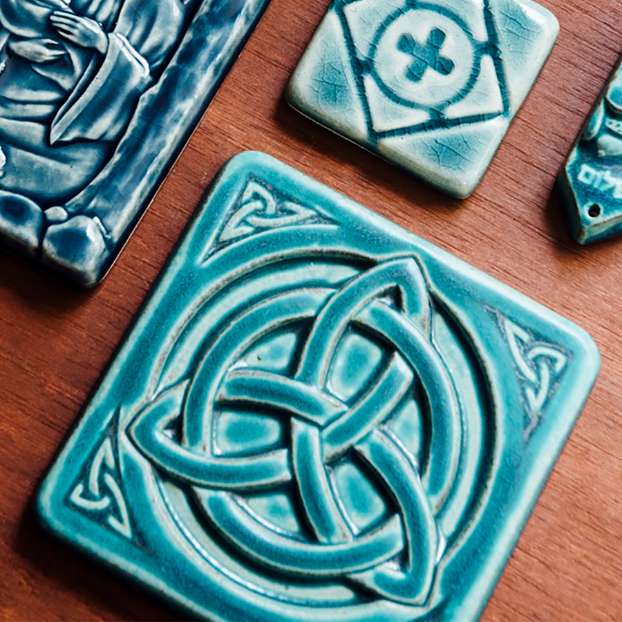 This tile features the matte turquoise Pewabic Blue glaze.