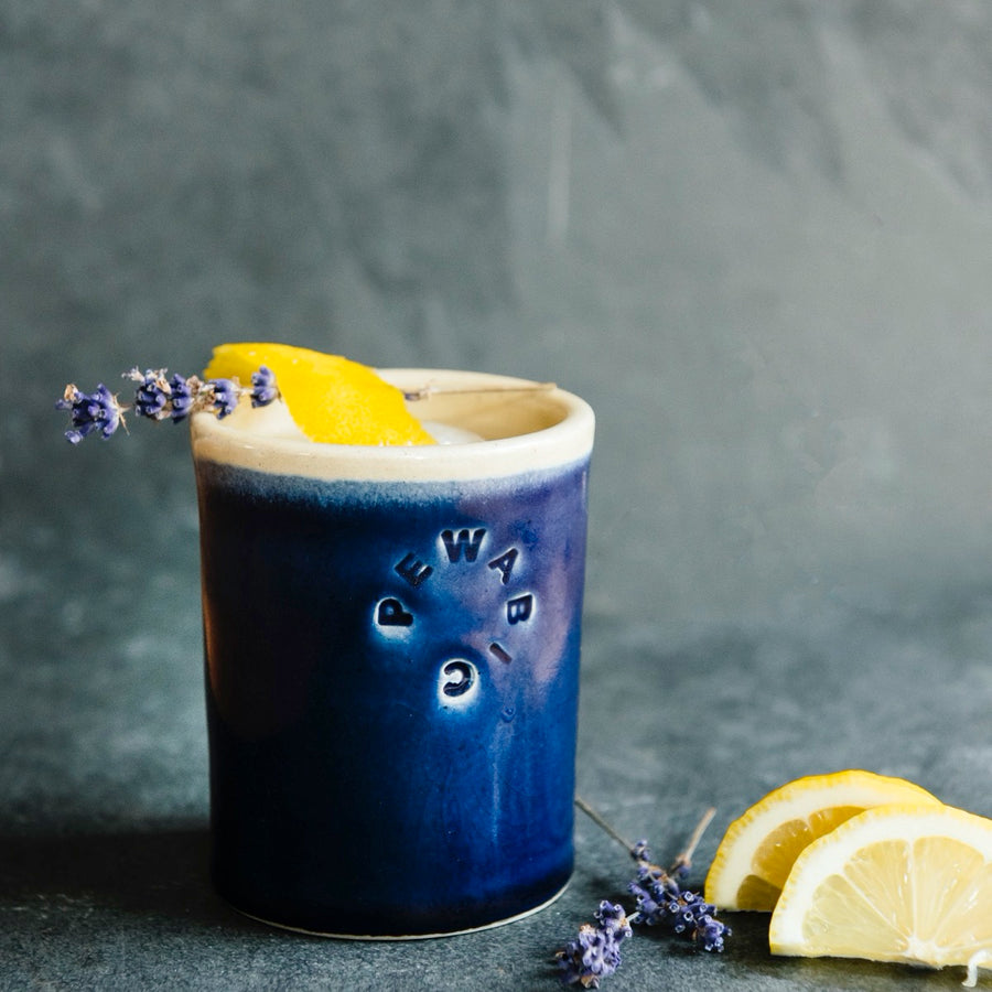 These cups feature the glossy deep dark blue Midnight glaze. The inner lining and lip of the cup have a creamy white color.