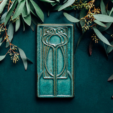 This moody tile sits among seeded eucalyptus.