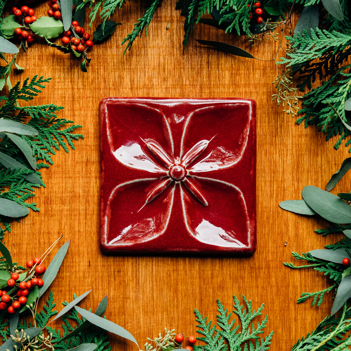 This tile features the glossy, deep red Winterberry glaze.