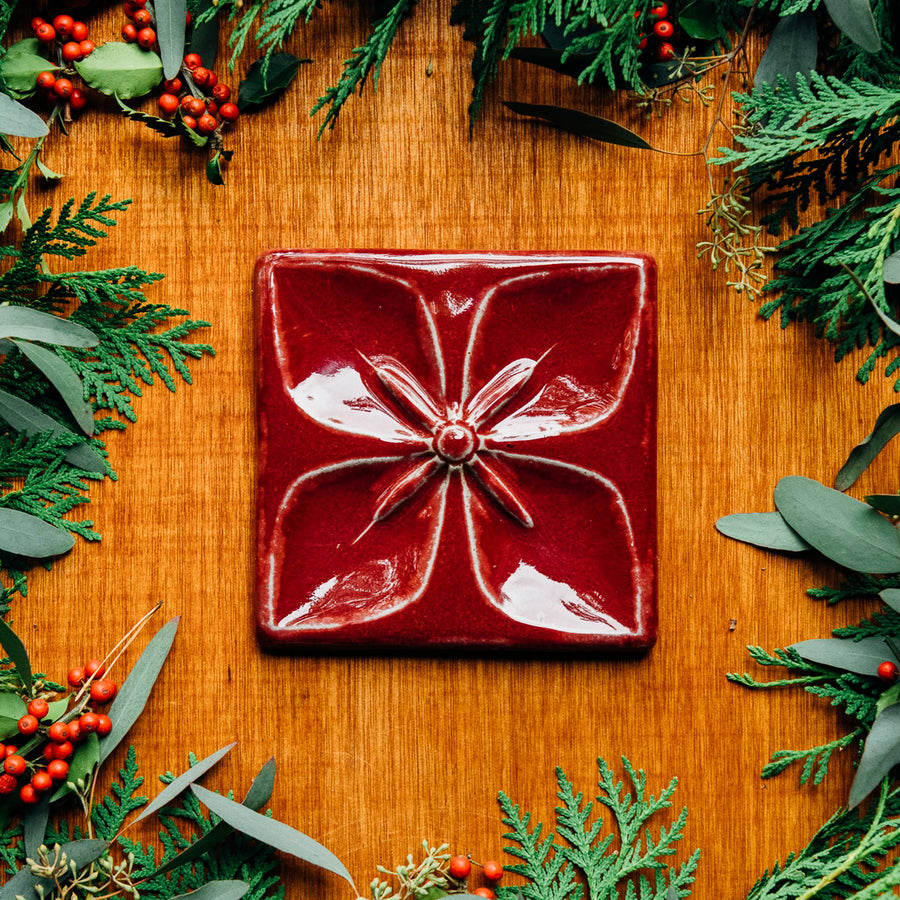 This tile features the glossy, deep red Winterberry glaze.