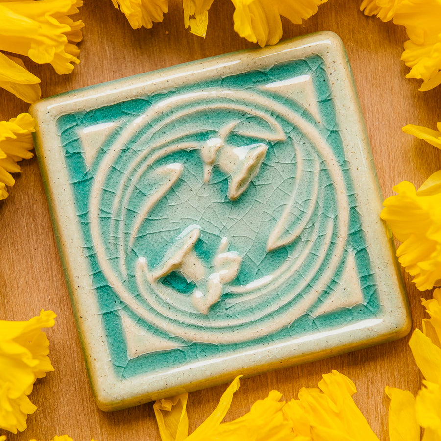 This Daffodil Tile features the glossy pale blue Celadon glaze.