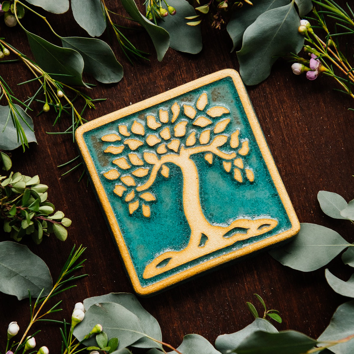 The Botanical Tree tile features a large tree motif with a line border around the tile edge.