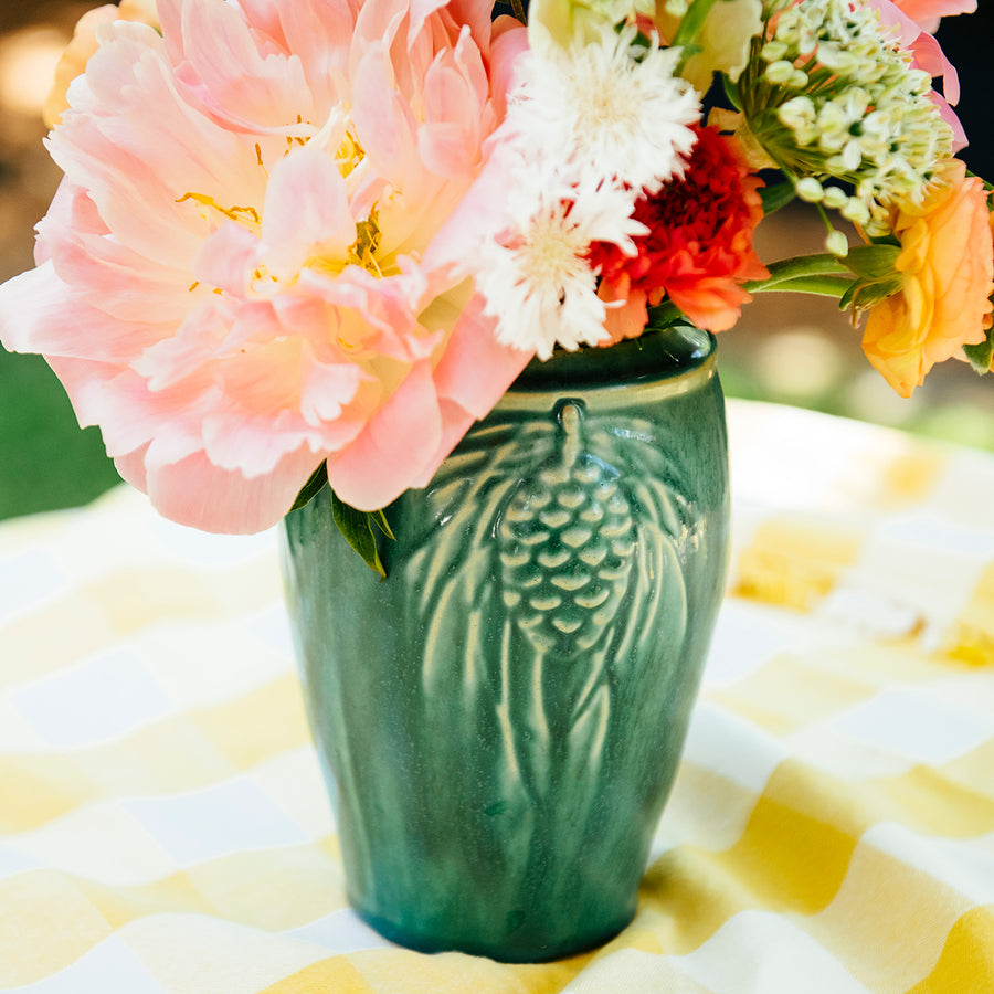 This vase features the matte blueish-green Pewabic Green glaze.