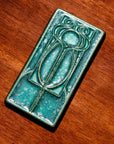 This tile features the crystalline, shimmering deep green Viridian glaze.