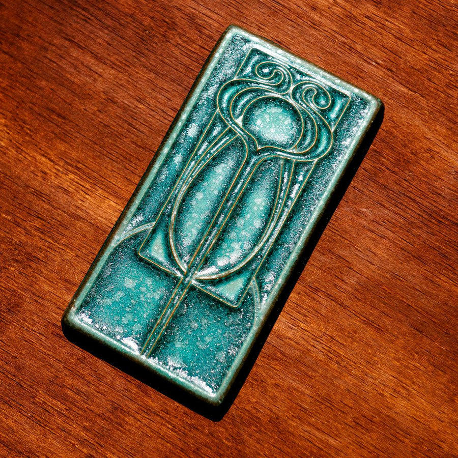This tile features the crystalline, shimmering deep green Viridian glaze.