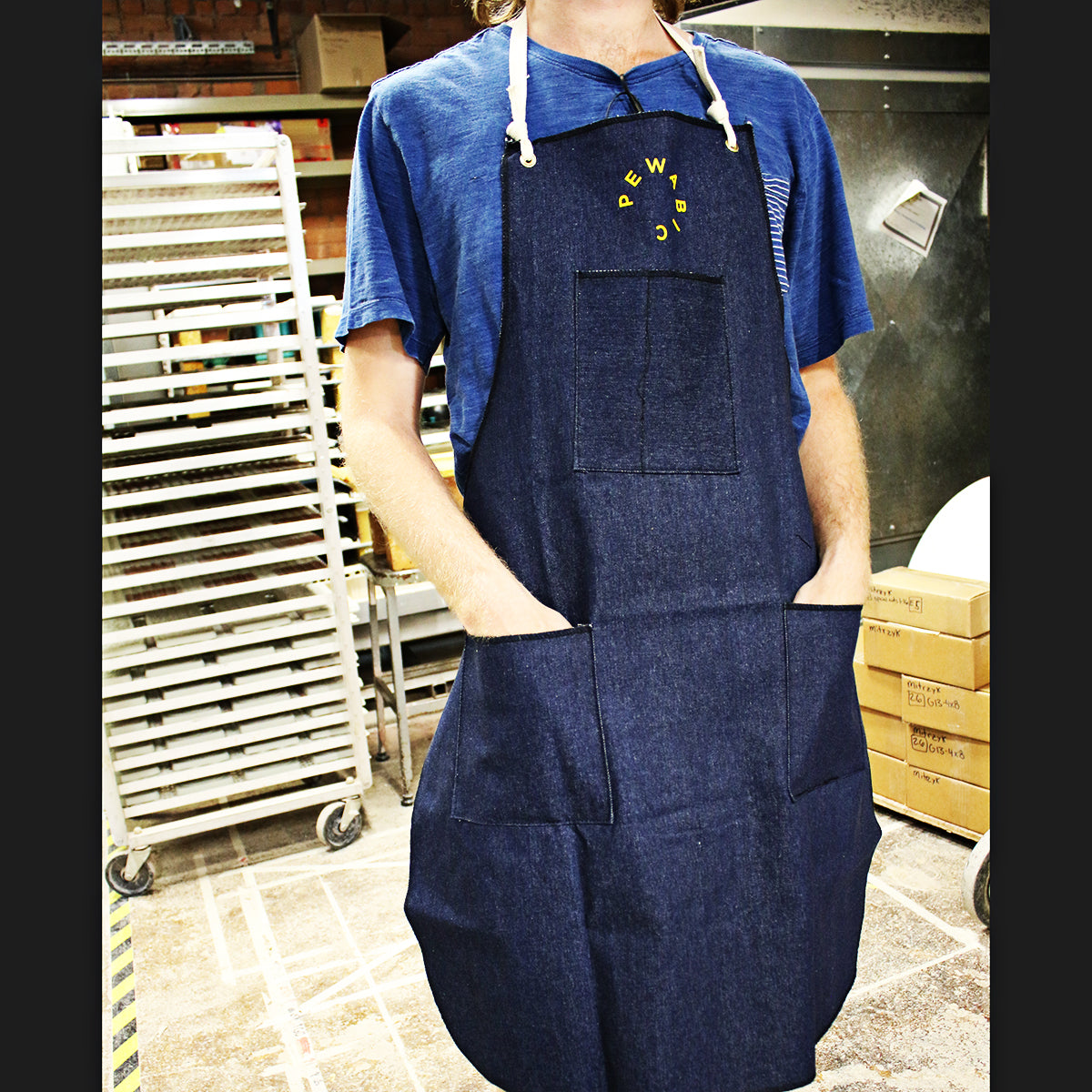 There is rope coming from each hip that will come behind the wearer's back to tie.