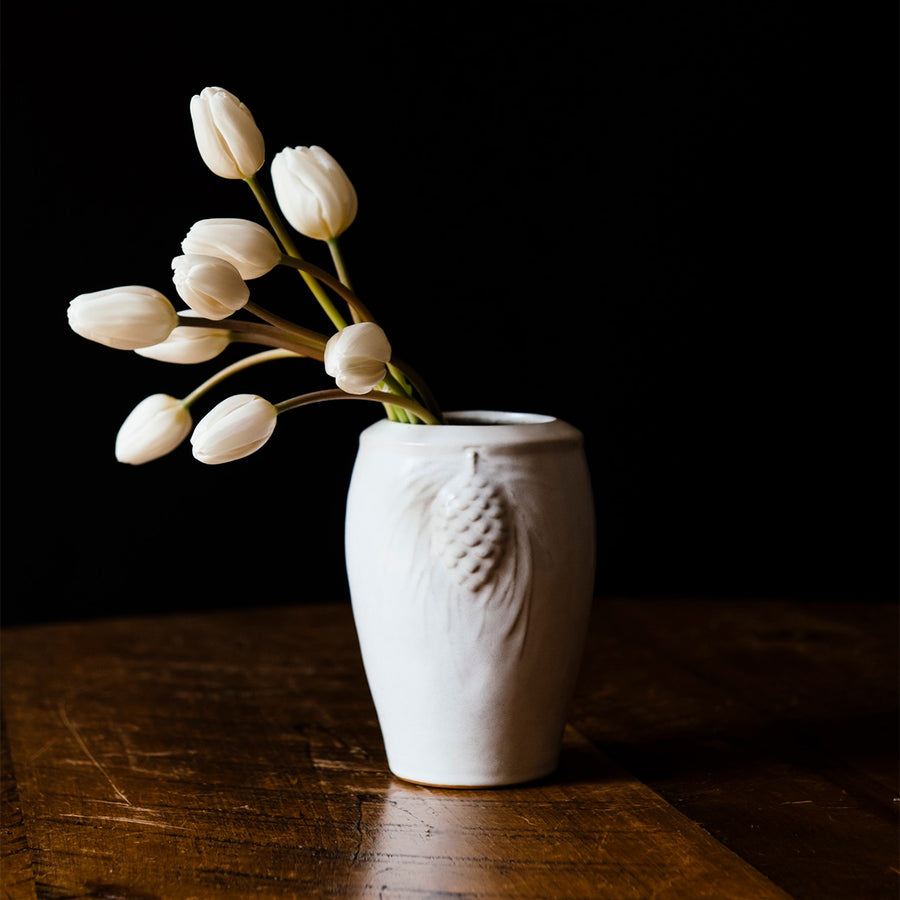 This vase features the creamy white Birch glaze that has some brown speckling from iron found in the glaze.