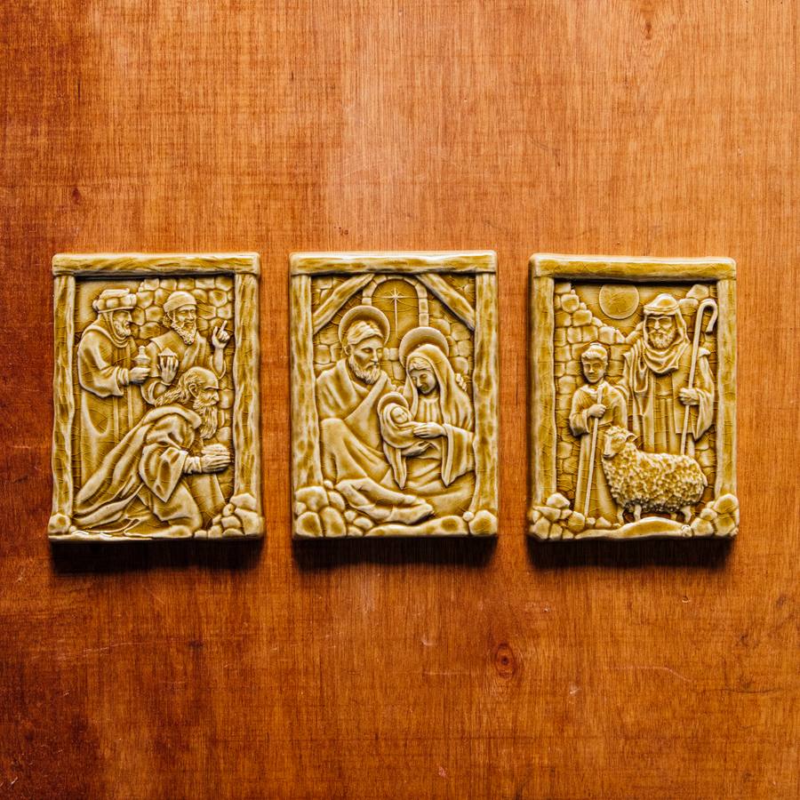 The three Nativity tiles sit next to each other- the holy family, the three wisemen and the shepherds.