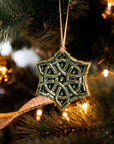 Shaped almost like a snowflake with 6 pointed corners, the Celtic Knot ornament features an intricate, winding pattern with no beginning or end. It is in our glossy deep green Kale glaze.