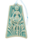 The ornament is glazed in a matte pale blue color.