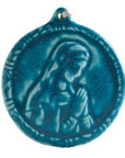 This ceramic Blessed Virgin Mary Ornament is glazed in a matte blue Peacock glaze.