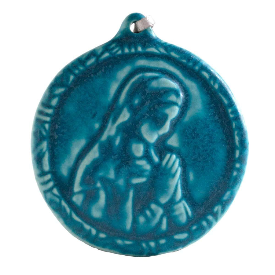 This ceramic Blessed Virgin Mary Ornament is glazed in a matte blue Peacock glaze.