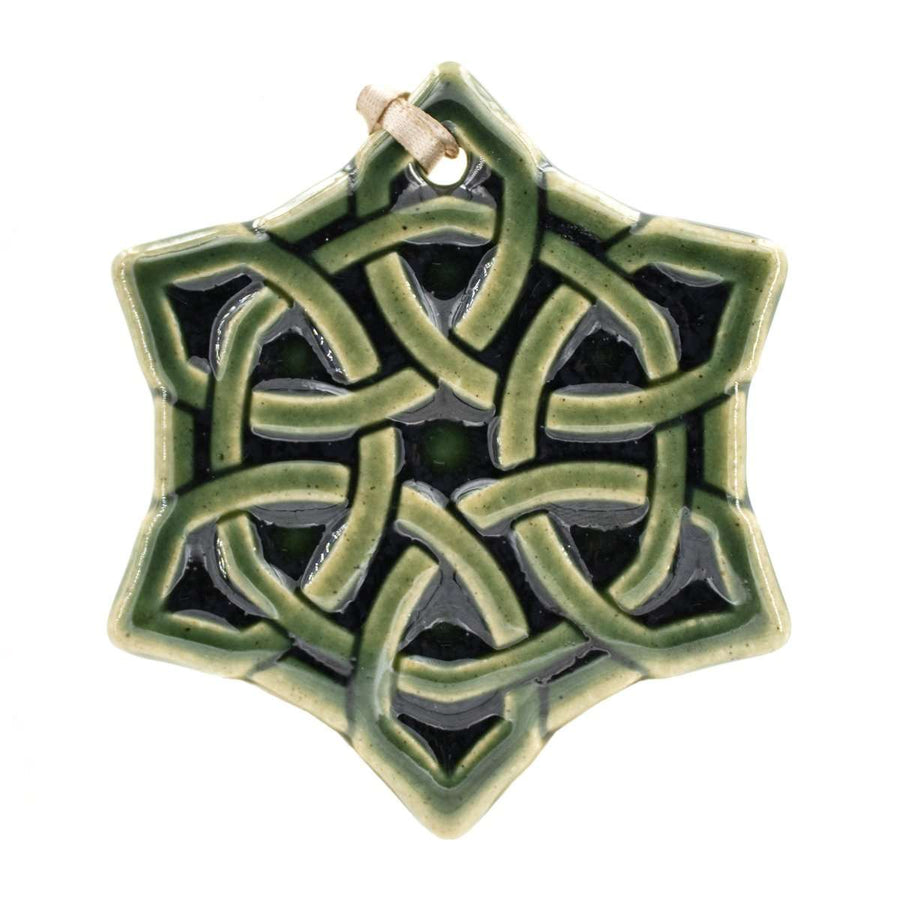 A close up of the Celtic Knot Ornament shows a circular ring that winds through the center of the design.