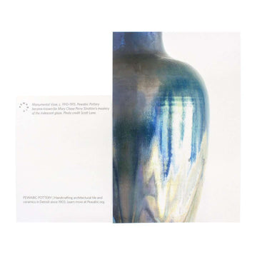 This postcard includes an image of a detail on a historic iridescent Pewabic vase. The vase has a pattern of blues and silvers seeming to drip down its side.
