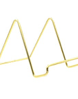 Angled view of 4" gold wire frame stand on white background