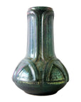 A Matte Green Iridescent glazed Celtic vase.